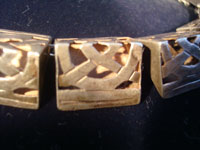 Mexican vintage silver jewelry, a lovely Taxco sterling silver necklace, c . 1940. The necklace is composed of silver carved and hollowed out trianglular pieces and is exquisite! A closeup photo of the Taxco silver necklace.