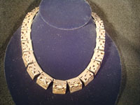 Mexican vintage silver jewelry, a lovely Taxco sterling silver necklace, c . 1940. The necklace is composed of silver carved and hollowed out trianglular pieces and is exquisite! Main photo.