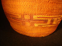 Native American Indian antique Tlingit basket with wonderful geometric bands around the sides, featuring red crosses, c. 1900. Another closeup photo of the designs on the Tlingit basket.