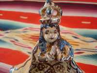 Mexican pottery and ceramics, a pottery figure of Our Lady of Good Health from Tzintzuntzan, Michoacan, c. 2010. Closeup photo.