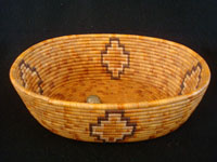 Native American Indian baskets, an incredibly beautiful Mission Indian basket with very colorful natural and dyed juncus, Southern California, c. 1920's. Main photo of the Mission Indian basket.