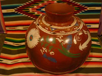 Mexican vintage pottery and ceramics, a lovely pottery jar or olla with wonderful decorations, including a whimsical rabbit, Michoacan, c. 1950's.  Photo of the second side of the jar.