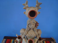 Mexican vintage folk art, a lovely pottery statue of a woman with a crown of deer and deer at the hem of her skirt, Atzompa, Oaxaca, c. 1960.  Another view of the statue.