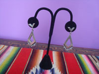 Mexican vintage sterling silver jewelry, and Taxco vintage sterling silver jewelry, a beautiful pair of dangling sterling silver earrings, Taxco, c. 1940's. Main photo of the Taxco earring.