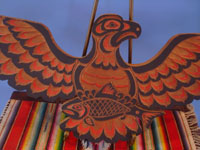 Native American Indian vintage folk art, a wonderful wood-carved plaque depicting a great eagle with a salmon by famous carver Tracy Powell, Washington State, c. 1983. Anotaher frontal view of the woodcarving.