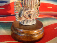 Mexican vintage devotional art, a pot-metal Virgen of Guadalup, c. 1930's. The Virgen is extremely beautiful. This is an incredible piece of Mexican fine/folk art and devotional art. A closeup photo of the bottom of the Virgen.
