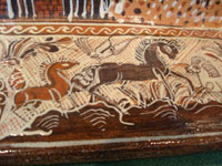 Mexican pottery and ceramics, a large rectangular pottery dish from Tonala, date December 18, 1995. The dish is signed, S. Lucano for the late Santos Lucano Neri, a famous Tonala potter and member of a famous family of potters and artisans. A closeup of one scene on the Lucano dish.