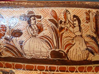 Mexican pottery and ceramics, a large rectangular pottery dish from Tonala, date December 18, 1995. The dish is signed, S. Lucano for the late Santos Lucano Neri, a famous Tonala potter and member of a famous family of potters and artisans. A scene of two Mexican women.