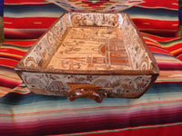 Mexican pottery and ceramics, a large rectangular pottery dish from Tonala, date December 18, 1995. The dish is signed, S. Lucano for the late Santos Lucano Neri, a famous Tonala potter and member of a famous family of potters and artisans. A side view of the dish.