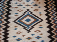 Mexican vintage sarapes and textiles, a rare Mayo weaving, c. 1930. Beautifully woven of wonderfully soft wool, and with vibrant colors of blue and brown. Photo of center diamond.
