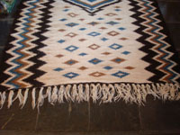 Mexican vintage sarapes and textiles, a rare Mayo weaving, c. 1930. Beautifully woven of wonderfully soft wool, and with vibrant colors of blue and brown. Photo showing one end of the Mayo textile.