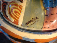 Mexican vintage pottery and ceramics and Mexican vintage folk art, a pair of small turkey casseroles from Tlaquepaque, Jalisco, c. 1930's. The pair is incredibly well made and well decorated. One of the two is signed near the wing, "Mexico". Photo showing the signature on the second casserole.