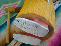 Native American Indian folk art and woodcarvings, a wonderful woodcarving of an old Navajo woman, signed by the great Navajo folk art woodcarver Johnson Antonio, Arizona or New Mexico, c. 1990. Photo of the bottom of the figure showing Johnson Antonio's signature and the date.