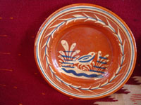 Mexican vintage pottery and ceramics, a very lovely set of three bandera-ware plates decorated with graceful birds, Tonala or San Pedro Tlaquepaque, c. 1940's. Closeup photo of the first plate.