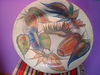 Mexican vintage pottery and ceramics, a lovely burnished pottery charger with graceful floral decorations of gorgeous bromiliads, Tonala, c. 1930's. Main photo of the charger.
