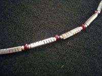 Mexican vintage silver jewelry and Taxco vintage silver jewelry, a sterling silver neclace with small rose garnet beads, signed Los Castillo, c. 1950. Another closeup.