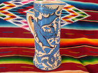 Mexican vintage pottery and ceramics, a large Fantasia-style pitcher, Tlaquepaque, c. 1930. Whimsical blue decorations on a cream-colored glaze, with dragons, flowers, leaves; all exquisitely painted. Main photo.