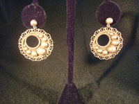 Mexican vintage silver jewelry and vintage Taxco silver jewelry, a pair of sterling silver earrings, marked on the back "Sterling 925", c. 1930-40. 