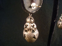 Mexican vintage silver jewelry and vintage Taxco silver jewelry, a pair of Mexican sterling silver earrings, c. 1930's. These features beautiful leaves around globular fruit, very much resembling a pomegranate. Back of earring with pin.