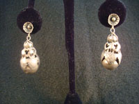Mexican vintage silver jewelry and vintage Taxco silver jewelry, a pair of Mexican sterling silver earrings, c. 1930's. These features beautiful leaves around globular fruit, very much resembling a pomegranate.
