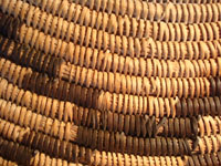 Native American Indian basket, a very large California Mission tray with geometric star pattern, c. 1920. This is an incredible Mission Indian basket and a collector's dream! Closeup photo.