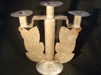 Mexican vintage tin or tinwork art, a candlelabra with beautiful form and simple stamping, c. 1930-40. This is a truly elegant piece of vintage Mexican tinwork.