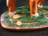 Mexican vintage pottery and ceramics, and Mexican vintage folk art, a pottery bull with fine hand-painted decoration, c. 1950. Signed on the bottom, Jose Trinidad Bernabe Lopez, Tonala, Jalisco Mexico. Photo of missing glaze on base.