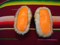 Native American Indian vintage folk art and beadwork, a pair of baby's mocassins from Alaska, probably Aleut, c. 1930-45. The mocassins feature a lovely bird design and wonderfully soft seal skin. Photo of the bottoms of the mocassins.