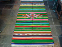 Mexican vintage sarapes and textiles, a beautiful Saltillo sarape with a green background and wonderful center diamond of silk, c. 1930's. Main photo of Saltillo sarape.