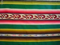 Mexican vintage Saltillo sarape, c. 1910-20, with wonderful center diamond with silk and real silver thread.