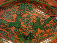 Mexican vintage pottery and ceramics, a lovely fantasia oval platter with a wonderful color-combination and fanciful artwork, Tonala or San Pedro Tlaquepaque, c. 1940's. Closeup photo of the artwork on the front of the platter.