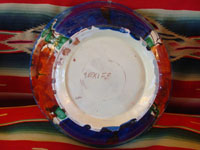 Mexican vintage pottery and ceramics, a drip-ware (goteado) bowl from Oaxaca, c. 1930-40. Photo of bottom of bowl, showing mark.