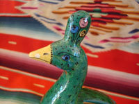 Mexican vintage pottery and ceramics, and Mexican vintage folk art, a peacock bank from Tlaquepaque, c. 1940. Beautifully hand-painted with wonderful colors. Closeup photo of the peacock's head and crown.