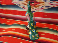 Mexican vintage pottery and ceramics, and Mexican vintage folk art, a peacock bank from Tlaquepaque, c. 1940. Beautifully hand-painted with wonderful colors. Photo of the back of the peacock.
