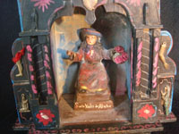 Mexican vintage devotional art, and Mexican vintage folk art, a wooden nicho with a bulto (carved wooden statue) of the Santo Nino de Atocha, c. 1940. This is a beautiful piece of vintage Mexican fine/folk art! A cloeup photo of the Santo Nino.