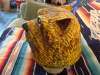 Mexican vintage wood-carving and folk art, a wonderfully carved and decorated helmet-style jaguar mask, used in dances and folk-festivals, from the Mexican state of Guerrero, c. 1950's. Photo showing the side of the Guerrero jaguar mask.