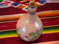 TT-3: Mexican vintage pottery and ceramics, a beautiful burnished jar from Tonala Jalisco, c. 1930's. Photo shot from above the Tonala jar, looking down.