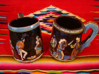 Mexican vintage pottery and ceramics, a wonderful pair of pottery mugs, with musicians, couples dancing, men drinking their tequila, all in relief and with beautiful animation and colors against a black background, Tonala or Tlaquepaque, Jalisco, c. 1930's.  Main photo of one side of the mugs.