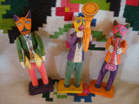 Mexican vintage folk art, and Mexican vintage woodcarvings and masks, a wonderful wood-carved set of three lively musicians, playing their little hearts out, San Martin Tejalapa, Oaxaca, c. 1950's. Main photo of the musicians.