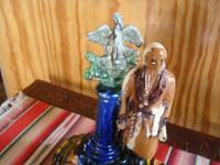 Mexican vintage folk art, and Mexican vintage pottery and ceramics, a wonderful pottery sculpture depicting Padre Miguel Hidalgo, the father of the Mexican revolution of 1810, Oaxaca, c. 1930's.  A side-view of the sculpture.