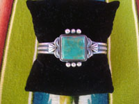 Native American Indian vintage sterling silver jewelry, and Navajo vintage sterling silver jewelry, a beautiful silver bracelet with a wonderful turquoise stone decorating the front, Arizona or New Mexico, c. 1950's. Main photo of the bracelet.