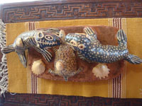 Mexican vintage folk art, a fanciful and wonderful pottery sculpture of two dueling seals and a startled turtle, Ocumicho, Michoacan, c. 1940's. Photo shot from above the Ocumicho sculpture looking down.