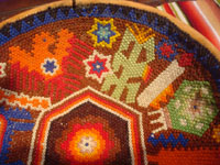 Mexican vintage folk art, a Huichol beaded gourd with very fine and intricate decorations in the beadwork, Jalisco or Nayarit, c. 1980's. Another closeup photo of the beadwork.