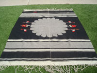 Vintage Mexican textiles and sarapes, a beautiful Oaxacan textile with naturally colored black and white wool, and with patriotic symbols of the Mexican flag, Oaxaca, c. 1940's.  Main photo of the textile.