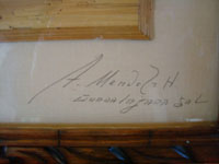Close-up photo of the signature of the artist