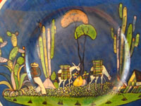 Closeup photo of the Tlaquepaque charger, signed Arias.