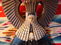Closeup photo of the wood carving of Our Lady of the Soledad