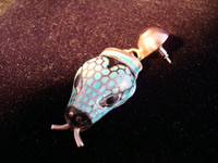 Margot de Taxco serpeant earrings, another closeup photo.