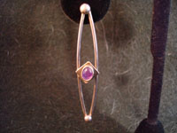 Mexican vintage silver dangling earrings, closeup.