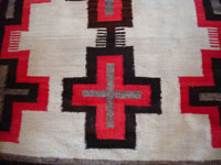 Closeup photo of Ganado Navajo rug with crosses